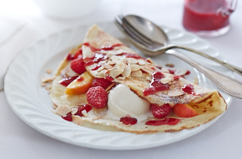 Peach melba crepes with almonds